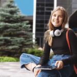 Girl with headphone and tablet